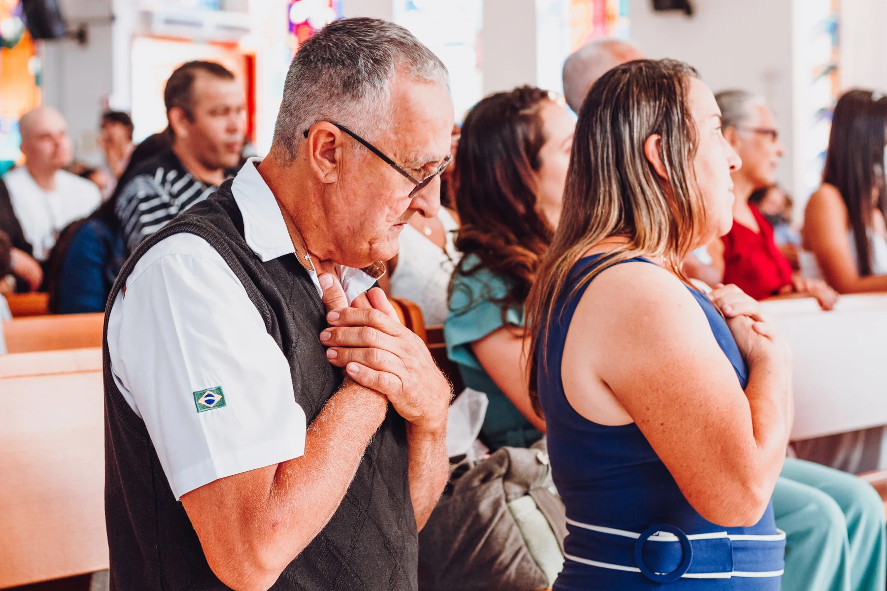 Two people talking at a congregation event.