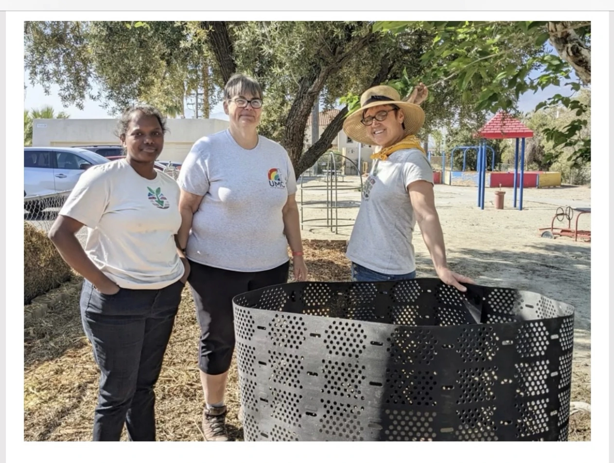 Three Changemaker volunteers outdoors.